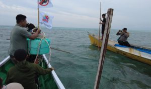 Pemasangan pelampung dan bendera penanda wilayah buka tutup